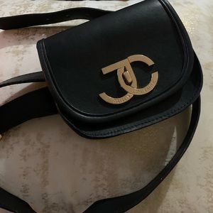 Juicy Couture black belt bag . L/Xl. Used . Good condition.